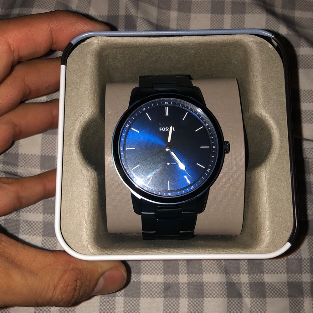 Platted fossil watch